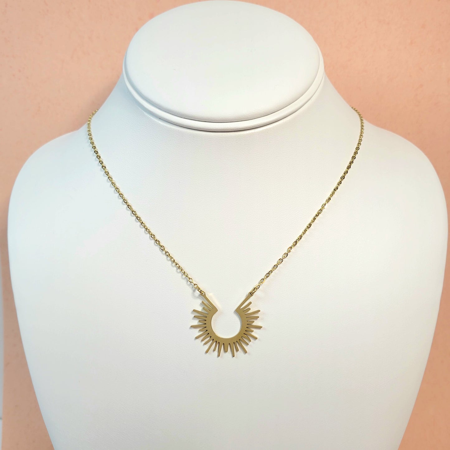 Open Sun Necklace. Gold or silver toned.