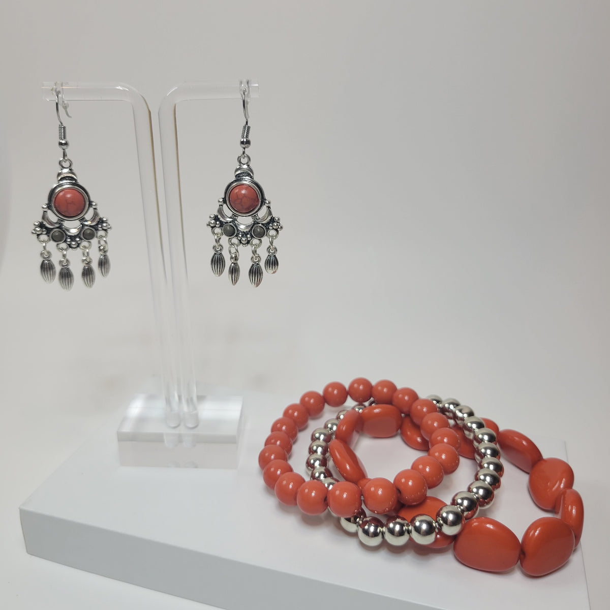 Orange and Silver Bracelet Set.