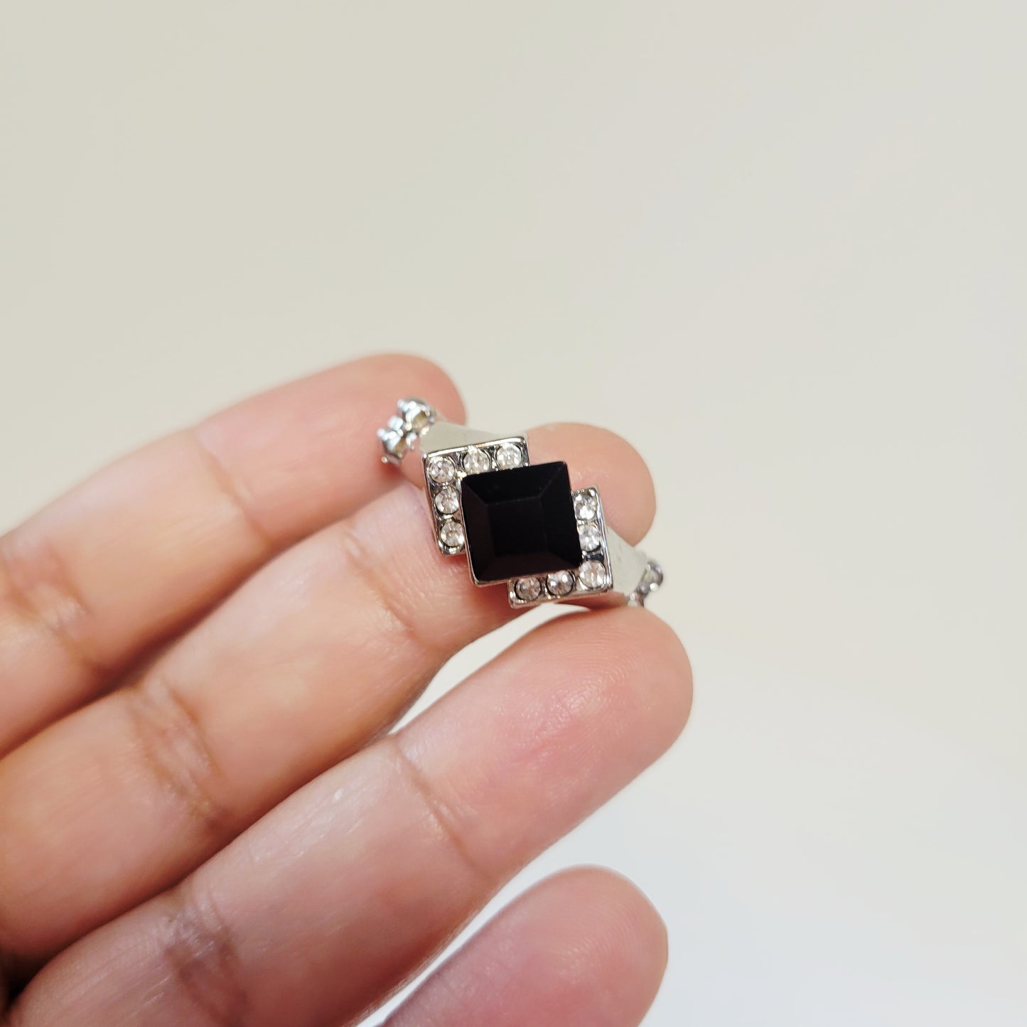 Black Rhinestone Ring. Size 7. Extendable. Silver-toned Elastic backing.