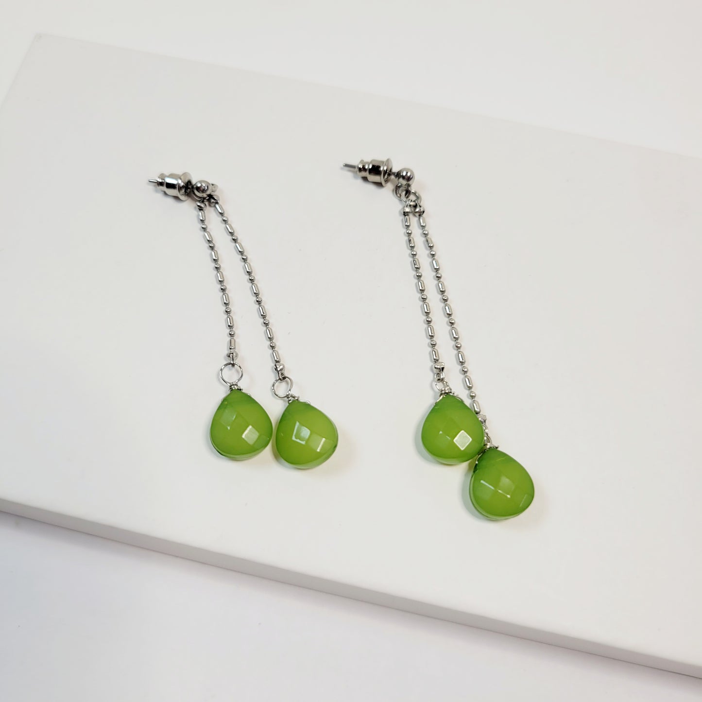 Pastel Green Drop Earring. Silver toned.