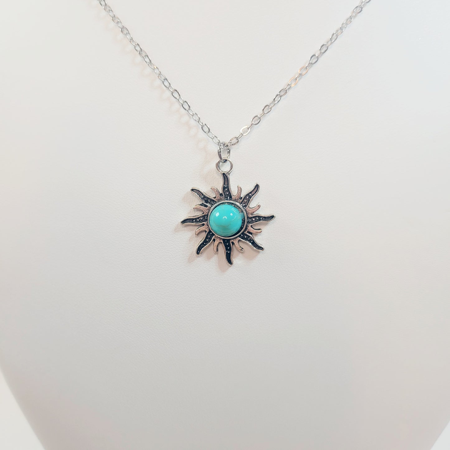 Turquoise Sun Pendant. Gold-toned.