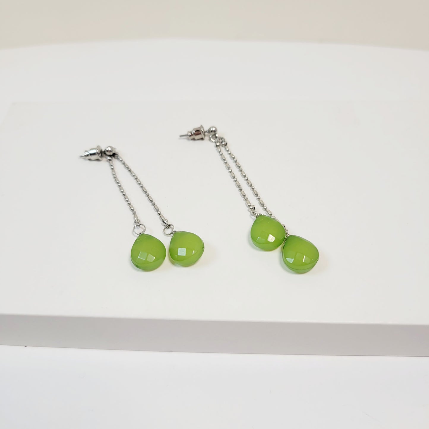 Pastel Green Drop Earring. Silver toned.