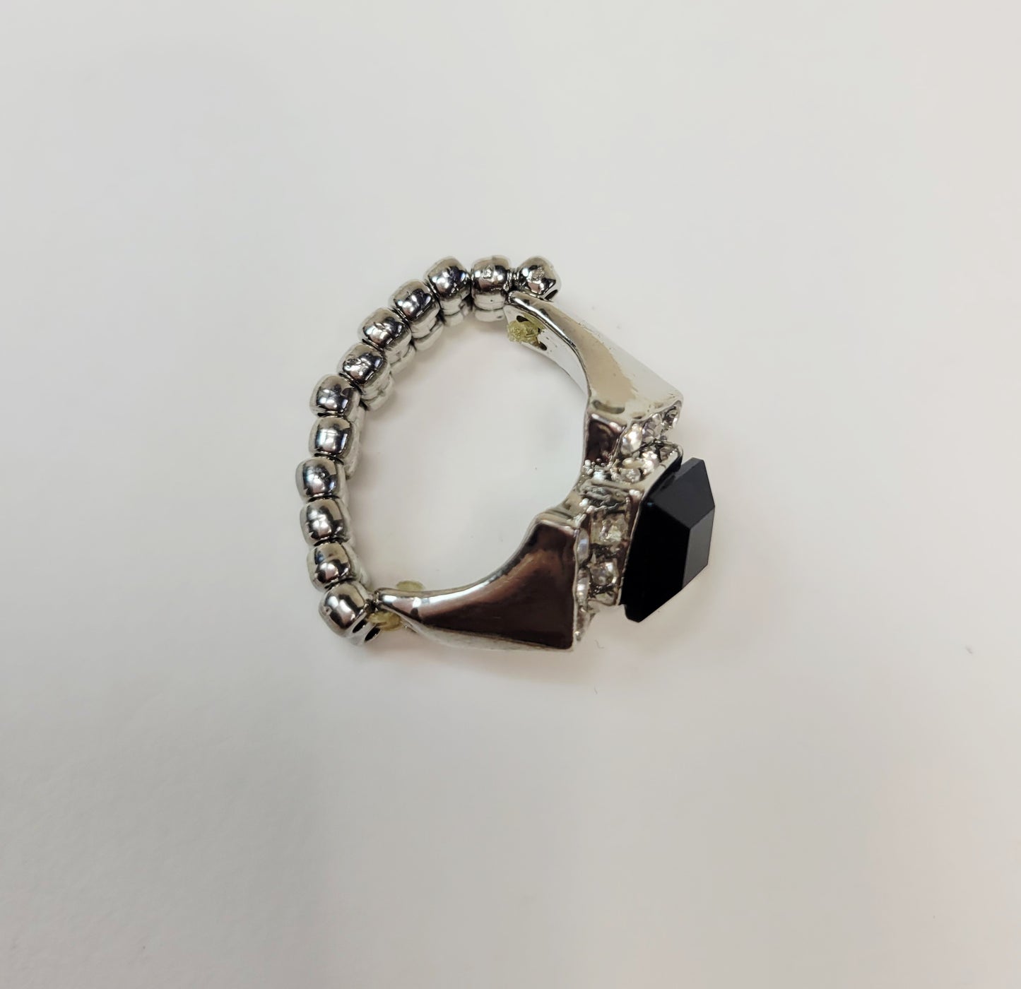 Black Rhinestone Ring. Size 7. Extendable. Silver-toned Elastic backing.