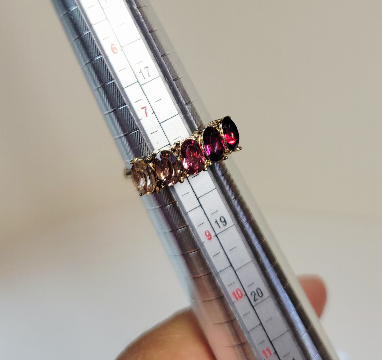 Rhinestone Pink Fade Ring. Size 8. Gold-toned band. Extendable. Pre-owned.