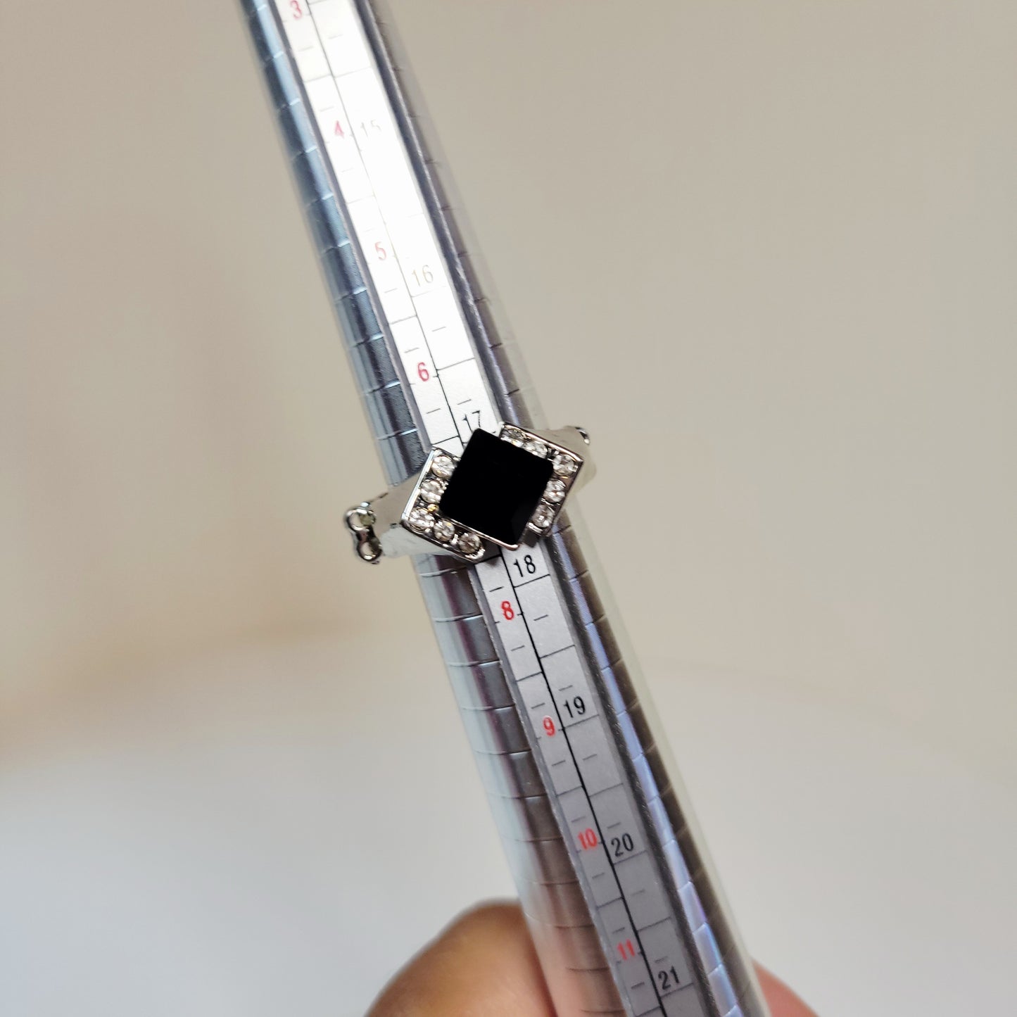 Black Rhinestone Ring. Size 7. Extendable. Silver-toned Elastic backing.