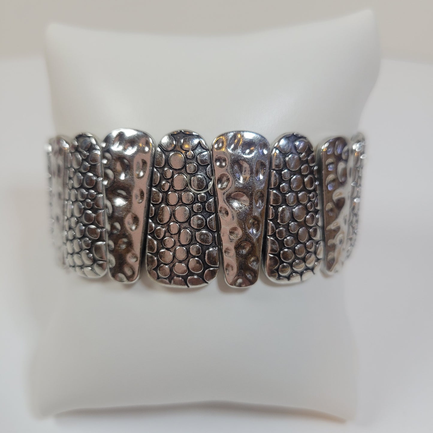 Silver-toned Bracelet with Asymmetric Pattern.