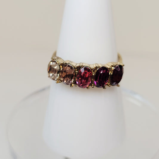 Rhinestone Pink Fade Ring. Size 8. Gold-toned band. Extendable. Pre-owned.