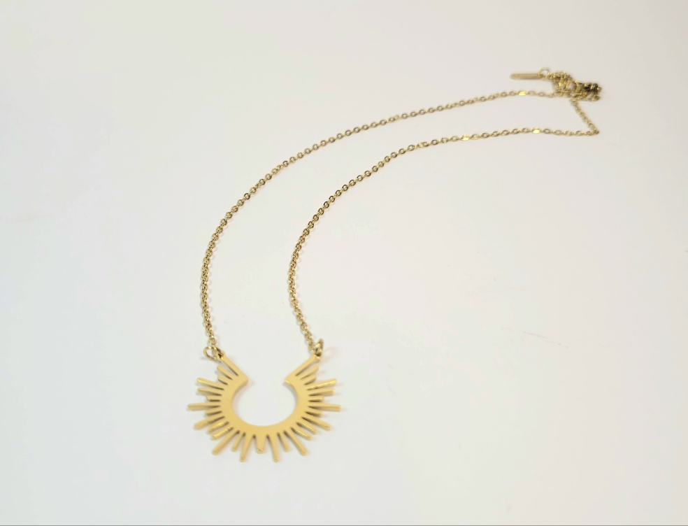 Open Sun Necklace. Gold or silver toned.