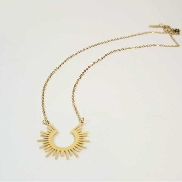 Open Sun Necklace. Gold or silver toned.